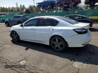 2017 Honda Accord Touring with VIN 1HGCR3F98HA021731, listed as a Copart auction lot 53645455 with 130,907 mi miles and Salvage title. Bid and sale history available at DreamBid. Image 2.