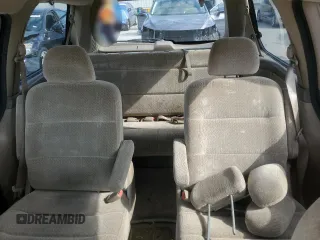 2000 Honda Odyssey LX z VIN 2HKRL1850YH575430, wystawiony jako Copart lot #53260255 z przebiegiem 188 847 mil mil oraz Szkoda całkowita • Salvage title. Historia ofert i sprzedaży dostępna na DreamBid. Obrazek 10.