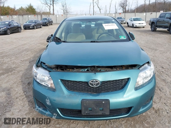 2009 Toyota Corolla with VIN JTDBL40E29J017358, listed as a IAAI auction lot 41041604 with 233,205 mi miles. Bid and sale history available at carsss.com. Image 12.