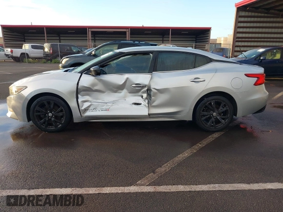 2016 Nissan Maxima S z VIN 1N4AA6AP1GC411633, wystawiony jako IAAI lot #41559508 z przebiegiem 95 240 mil mil oraz . Historia ofert i sprzedaży dostępna na DreamBid. Obrazek 14.