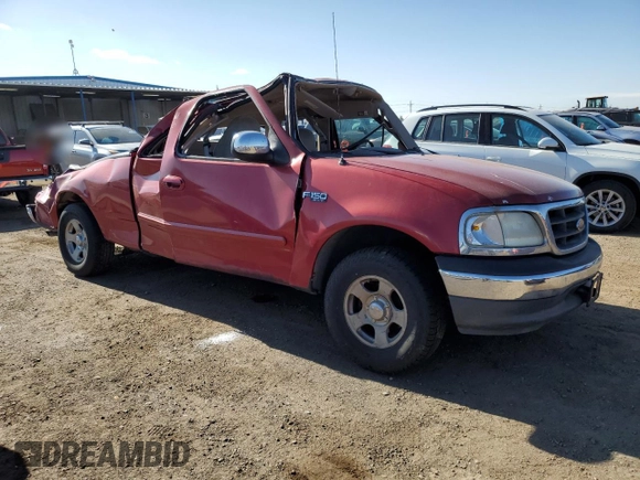 2000 Ford F-150 XL with VIN 1FTZX1728YNA87502, listed as a Copart auction lot 54870295 with 219,971 mi miles and Salvage title. Bid and sale history available at DreamBid. Image 4.