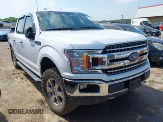 2018 Ford F-150 XL z VIN 1FTEW1EP9JKE58173, wystawiony jako IAAI lot #42389998 z przebiegiem 129 512 mil mil oraz . Historia ofert i sprzedaży dostępna na DreamBid. Obrazek 1.