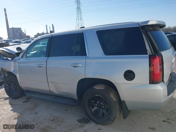 2018 Chevrolet Tahoe Commercial with VIN 1GNSKDEC1JR340887, listed as a IAAI auction lot 41044038 with 99,500 mi miles. Bid and sale history available at carsss.com. Image 14.