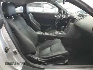 2003 Nissan 350Z Touring с VIN JN1AZ34D03T114076, выставлен на аукционе Copart как лот 61078255 с пробегом 187 952 миль миль и Списание • Salvage title. История ставок и продаж доступна на DreamBid. Изображение 7.