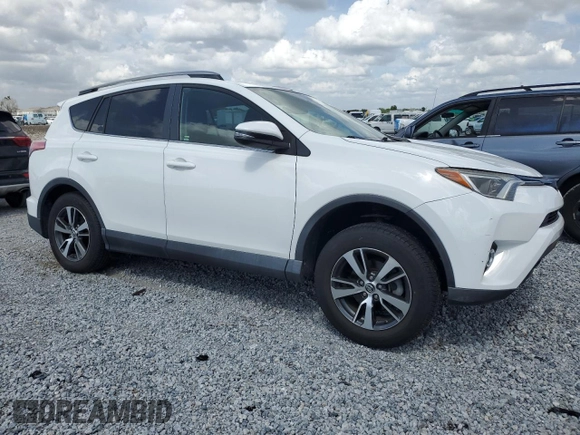 2018 Toyota RAV4 XLE with VIN 2T3RFREV1JW843426, listed as a Copart auction lot 52283125 with 12,809 mi miles and Salvage Title. Bid and sale history available at DreamBid. Image 4.