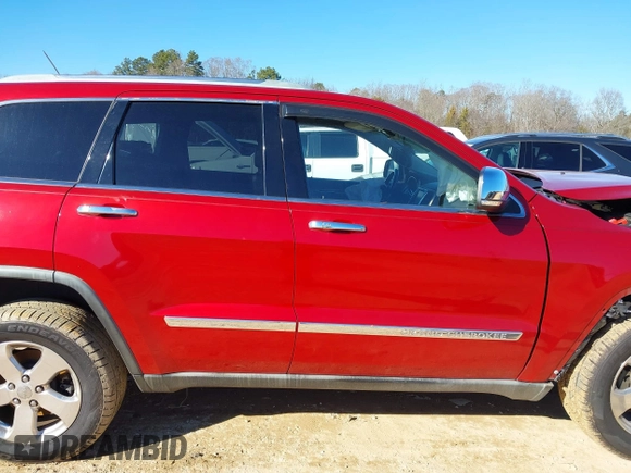 2011 Jeep Grand Cherokee Limited z VIN 1J4RR5GG0BC703946, wystawiony jako IAAI lot #41341735 z przebiegiem 139 389 mil mil oraz . Historia ofert i sprzedaży dostępna na DreamBid. Obrazek 13.