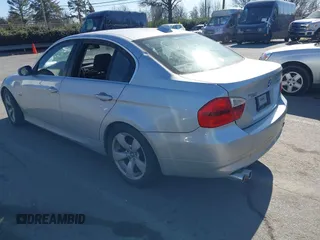 2006 BMW 3 Series 330xi with VIN WBAVD33566KV63437, listed as a IAAI auction lot 41378595 with 169,691 mi miles. Bid and sale history available at carsss.com. Image 3.
