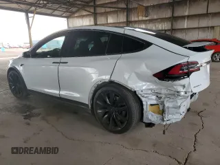 2018 Tesla Model X 75D with VIN 5YJXCBE23JF133589, listed as a Copart auction lot 55573715 with 89,234 mi miles and Salvage Title. Bid and sale history available at DreamBid. Image 2.