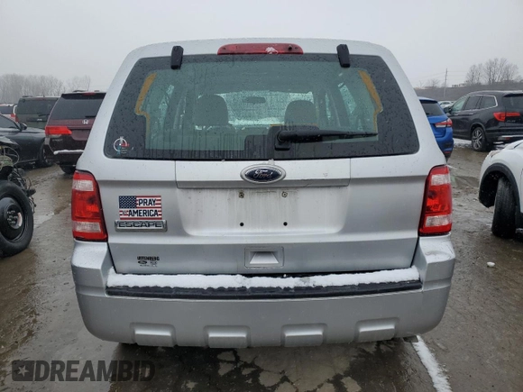 2010 Ford Escape XLS с VIN 1FMCU0C77AKD47899, выставлен на аукционе Copart как лот 45043535 с пробегом Не указан миль и Списание • Salvage title. История ставок и продаж доступна на DreamBid. Изображение 6.