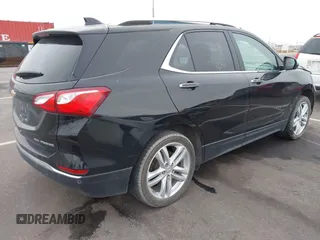 2021 Chevrolet Equinox Premier z VIN 2GNAXXEV4M6118442, wystawiony jako IAAI lot #41392148 z przebiegiem 92 170 mil mil oraz . Historia ofert i sprzedaży dostępna na DreamBid. Obrazek 4.