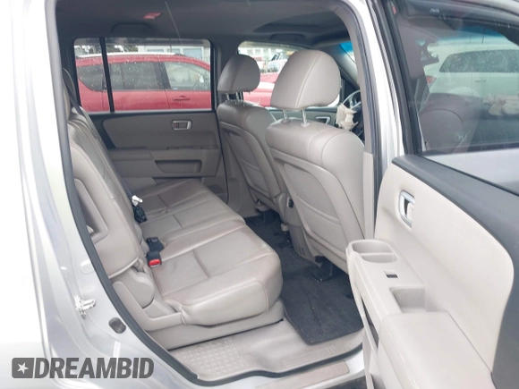 2012 Honda Pilot EX-L with VIN 5FNYF4H71CB053886, listed as a IAAI auction lot 41658180 with 140,541 mi miles and . Bid and sale history available at DreamBid. Image 8.