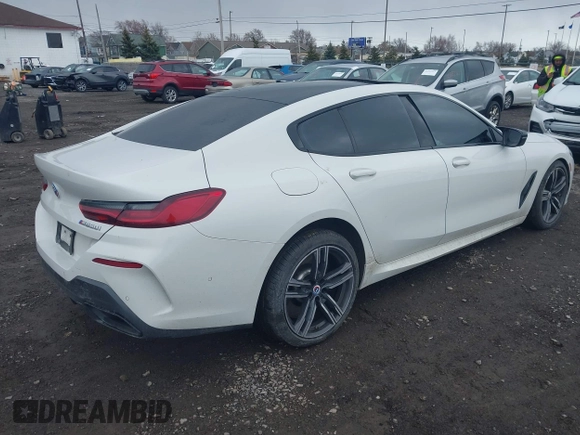2023 BMW 8 Series M850i with VIN WBAGV8C06PCK97193, listed as a IAAI auction lot 41888779 with 40,845 mi miles and . Bid and sale history available at DreamBid. Image 4.