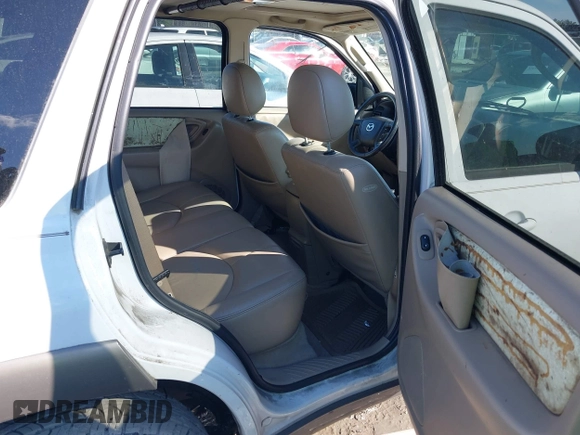 2004 Mazda Tribute ES with VIN 4F2CZ06164KM12579, listed as a IAAI auction lot 41654646 with 208,120 mi miles. Bid and sale history available at carsss.com. Image 8.