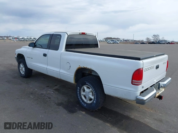 1998 Dodge Dakota SLT with VIN 1B7GG22X8WS677553, listed as a IAAI auction lot 41854961 with 167,917 mi miles and . Bid and sale history available at carsss.com. Image 3.