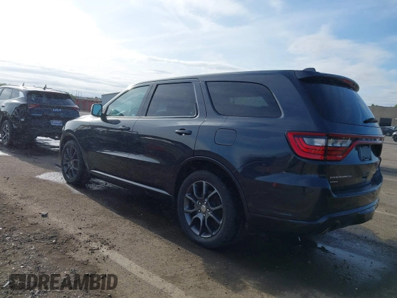 2015 Dodge Durango R/T with VIN 1C4SDJCT1FC188401, listed as a IAAI auction lot 42124652 with 86,339 mi miles and . Bid and sale history available at carsss.com. Image 3.