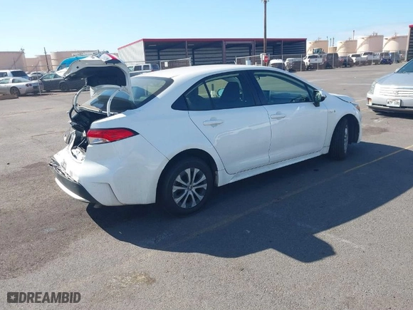 2020 Toyota Corolla Hybrid LE with VIN JTDEBRBE7LJ009256, listed as a IAAI auction lot 41210201 with 35,534 mi miles. Bid and sale history available at carsss.com. Image 4.