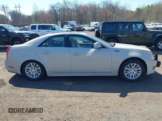 2011 Cadillac CTS Luxury with VIN 1G6DF5EY4B0114245, listed as a IAAI auction lot 42029416 with 83,473 mi miles and . Bid and sale history available at DreamBid. Image 13.