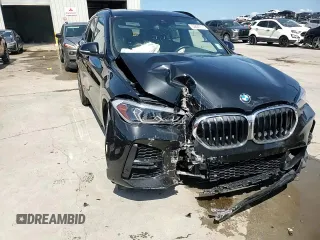 2021 BMW X1 sDrive28i z VIN WBXJG7C04M5U03124, wystawiony jako Copart lot #54447515 z przebiegiem 11 794 mil mil oraz Szkoda całkowita • Salvage title. Historia ofert i sprzedaży dostępna na DreamBid. Obrazek 14.