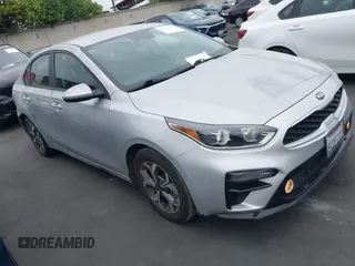 2021 Kia Forte LXS with VIN 3KPF24AD5ME387610, listed as a IAAI auction lot 42133985 with 31,437 mi miles and . Bid and sale history available at carsss.com. Image 1.