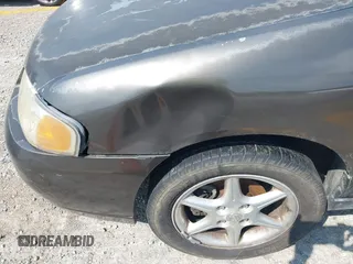 2001 Nissan Sentra SE z VIN 3N1BB51D61L127666, wystawiony jako IAAI lot #42400126 z przebiegiem 190 345 mil mil oraz . Historia ofert i sprzedaży dostępna na DreamBid. Obrazek 12.