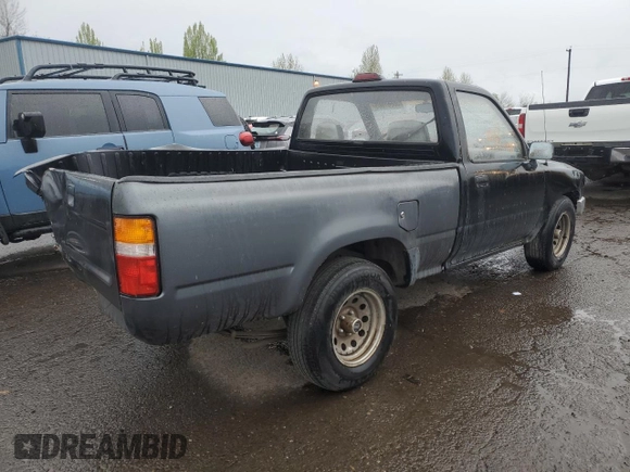 1995 Toyota Pickup with VIN JT4RN81AXS5201652, listed as a Copart auction lot 50661685 with 231,649 mi miles and Salvage title. Bid and sale history available at DreamBid. Image 3.