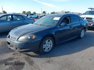 2013 Chevrolet Impala LT with VIN 2G1WG5E34D1221464, listed as a IAAI auction lot 40400538 with 146,571 mi miles and . Bid and sale history available at DreamBid. Image 2.