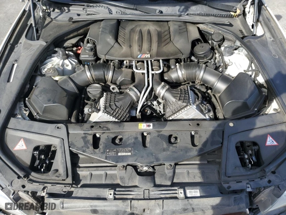 2014 BMW M5 with VIN WBSFV9C56ED097642, listed as a Copart auction lot 77905514 with 77,022 mi miles and Salvage Title. Bid and sale history available at carsss.com. Image 11.