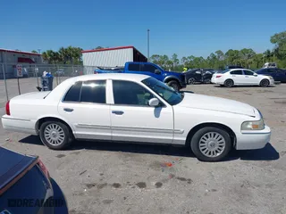 2007 Mercury Grand Marquis LS with VIN 2MEFM75VX7X623356, listed as a IAAI auction lot 41783361 with 157,921 mi miles. Bid and sale history available at carsss.com. Image 14.