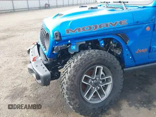 2024 Jeep Gladiator Mojave X z VIN 1C6JJTEG5RL121313, wystawiony jako IAAI lot #41013599 z przebiegiem 2 952 mil mil oraz . Historia ofert i sprzedaży dostępna na DreamBid. Obrazek 18.
