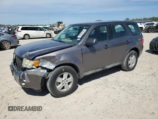 2009 Ford Escape XLS with VIN 1FMCU92789KC19902, listed as a Copart auction lot 49556105 with 115,522 mi miles and Salvage title. Bid and sale history available at DreamBid. Image 1.
