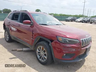 2020 Jeep Cherokee Latitude Plus z VIN 1C4PJLLBXLD547610, wystawiony jako IAAI lot #42019215 z przebiegiem 97 207 mil mil oraz . Historia ofert i sprzedaży dostępna na DreamBid. Obrazek 1.