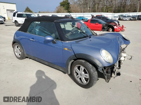 2005 MINI Convertible with VIN WMWRF33555TF62593, listed as a Copart auction lot 48305985 with 172,839 mi miles and Salvage title. Bid and sale history available at DreamBid. Image 4.