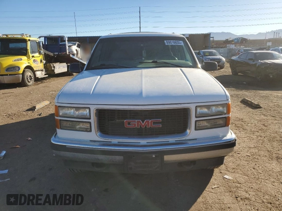 1999 GMC Denali z VIN 1GKEK13R5XR503159, wystawiony jako Copart lot #89018655 z przebiegiem 229 819 mil mil oraz Czysty tytuł • Clean title. Historia ofert i sprzedaży dostępna na DreamBid. Obrazek 5.