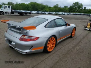 2007 Porsche 911 z VIN WP0AC29927S792403, wystawiony jako Copart lot #57745575 z przebiegiem 12 527 mil mil oraz Szkoda całkowita • Salvage title. Historia ofert i sprzedaży dostępna na DreamBid. Obrazek 3.