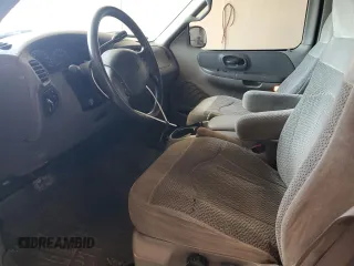 1999 Ford F-150 XL z VIN 1FTRX17L5XNB13867, wystawiony jako Copart lot #57616185 z przebiegiem Nie podano mil oraz Nie do naprawy • Non repairable. Historia ofert i sprzedaży dostępna na DreamBid. Obrazek 7.