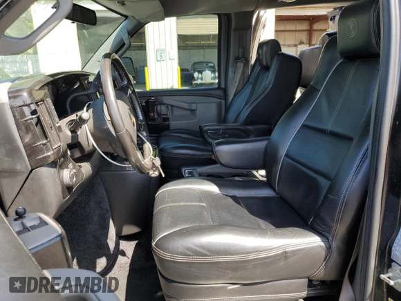 2018 Chevrolet Express Cargo Van with VIN 1GCWGBFG5J1242705, listed as a Copart auction lot 55627615 with 77,611 mi miles and Clean Title. Bid and sale history available at carsss.com. Image 7.