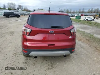 2018 Ford Escape SE z VIN 1FMCU9GD1JUC72707, wystawiony jako Copart lot #47829264 z przebiegiem 96 341 mil mil oraz Szkoda całkowita • Salvage title. Historia ofert i sprzedaży dostępna na DreamBid. Obrazek 6.