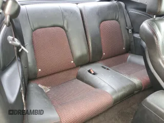 2006 Hyundai Tiburon GT z VIN KMHHN65F66U215304, wystawiony jako Copart lot #56141635 z przebiegiem 149 118 mil mil oraz Szkoda całkowita • Salvage title. Historia ofert i sprzedaży dostępna na DreamBid. Obrazek 10.