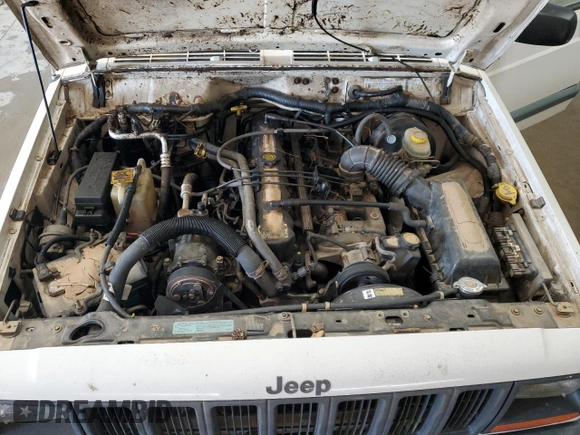 1997 Jeep Cherokee Sport with VIN 1J4FJ68S2VL518188, listed as a Copart auction lot 77459464 with 0 mi miles and Non Repairable. Bid and sale history available at carsss.com. Image 12.