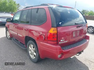 2002 GMC Envoy SLT z VIN 1GKDT13S922268682, wystawiony jako IAAI lot #42348610 z przebiegiem 191 745 mil mil oraz . Historia ofert i sprzedaży dostępna na DreamBid. Obrazek 3.