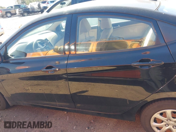 2012 Hyundai Accent GLS with VIN KMHCT4AE3CU265199, listed as a IAAI auction lot 41826958 with 121,618 mi miles. Bid and sale history available at carsss.com. Image 14.