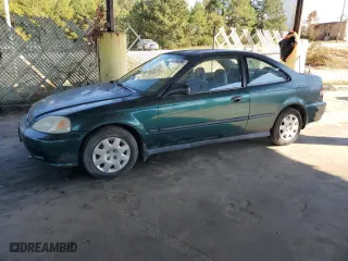 1999 Honda Civic DX with VIN 1HGEJ6224XL039608, listed as a Copart auction lot 77788394 with 292,199 mi miles and Clean Title. Bid and sale history available at carsss.com. Image 1.