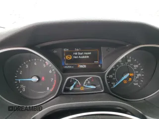2018 Ford Focus Titanium z VIN 1FADP3N21JL295883, wystawiony jako Copart lot #59051015 z przebiegiem 43 284 mil mil oraz Szkoda całkowita • Salvage title. Historia ofert i sprzedaży dostępna na DreamBid. Obrazek 9.