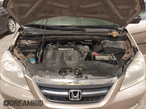 2006 Honda Odyssey LX with VIN 5FNRL38256B113667, listed as a IAAI auction lot 41856860 with 142,031 mi miles. Bid and sale history available at carsss.com. Image 10.