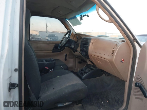 2003 Ford Ranger XL with VIN 1FTYR10U33PA51778, listed as a IAAI auction lot 42053678 with 216,513 mi miles. Bid and sale history available at carsss.com. Image 5.