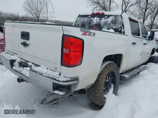 2014 Chevrolet Silverado 1500 LT with VIN 3GCUKREC3EG347070, listed as a IAAI auction lot 41246225 with 180,446 mi miles. Bid and sale history available at carsss.com. Image 4.