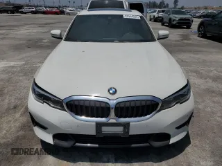 2022 BMW 3 Series 330i with VIN 3MW5R1J04N8C53879, listed as a Copart auction lot 57444544 with 27,972 mi miles and Salvage Title. Bid and sale history available at carsss.com. Image 5.