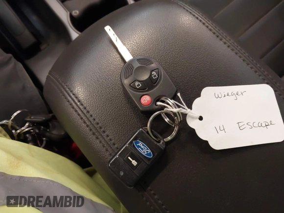 2014 Ford Escape SE with VIN 1FMCU9G95EUA16328, listed as a IAAI auction lot 42464235 with 108,570 mi miles and . Bid and sale history available at DreamBid. Image 11.