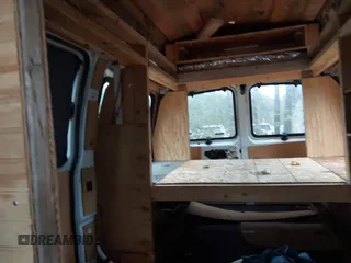 2002 Chevrolet Chevy Van z VIN 1GBFG15MX21125029, wystawiony jako IAAI lot #41740176 z przebiegiem Nie podano mil oraz . Historia ofert i sprzedaży dostępna na DreamBid. Obrazek 8.
