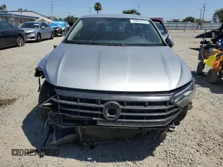 2019 Volkswagen Jetta S with VIN 3VWN57BU2KM245945, listed as a Copart auction lot 63874175 with 104,191 mi miles and Salvage title. Bid and sale history available at DreamBid. Image 5.